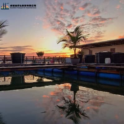 Wooden fishing walkway and platform over the sea at 99 Resort Johor kelong